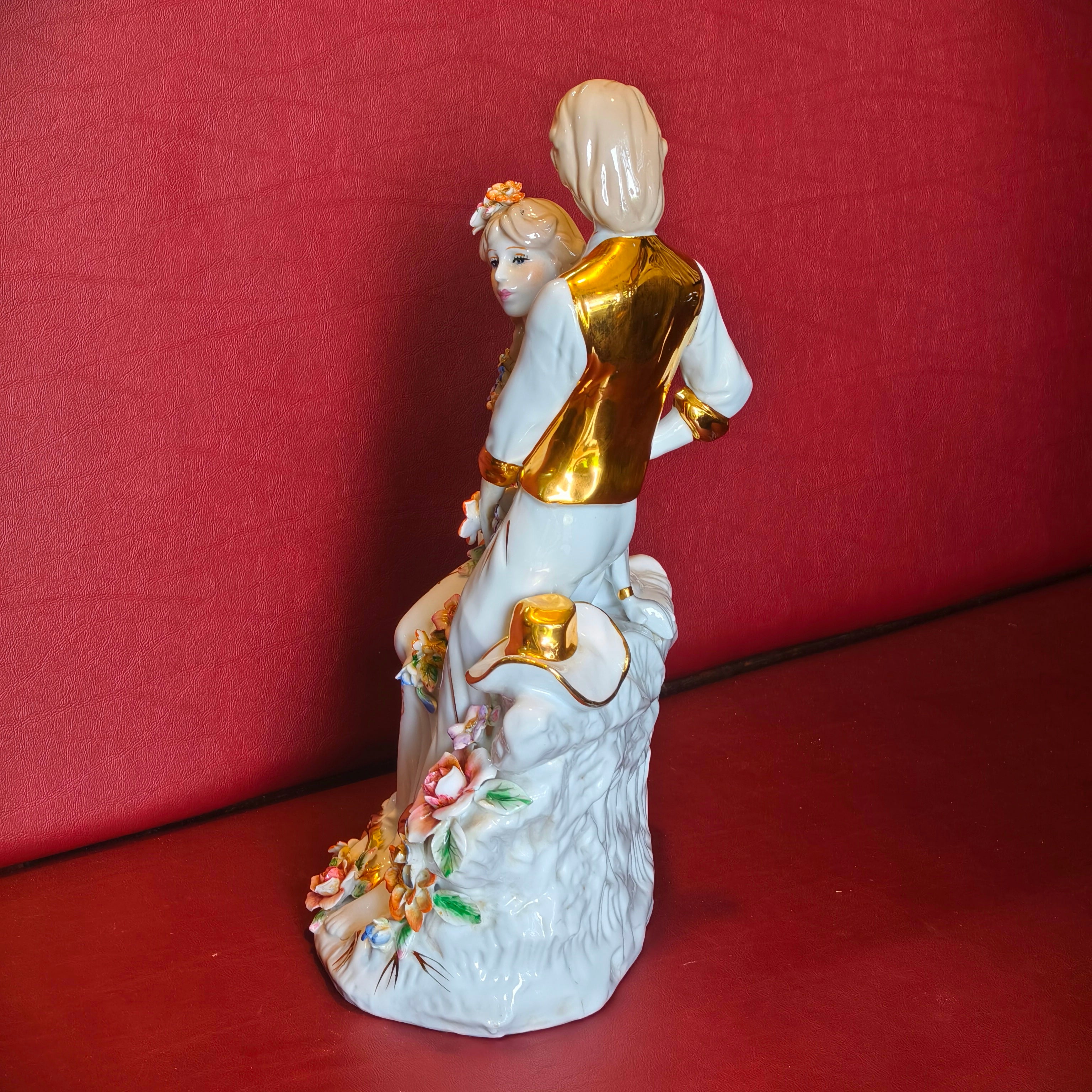 ENGLISH PORCELAIN FIGURINE