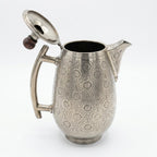 VINTAGE SILVER COATED BRASS JUG 10