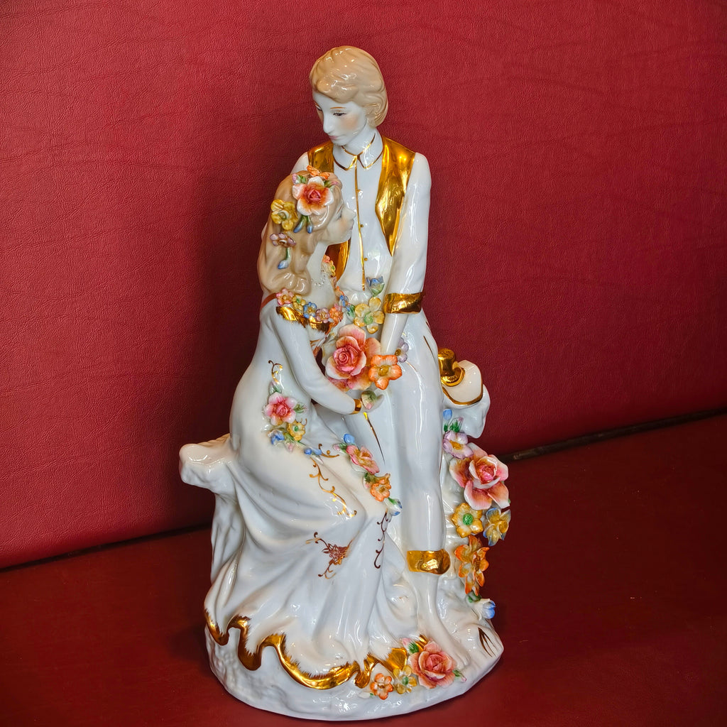 ENGLISH PORCELAIN FIGURINE