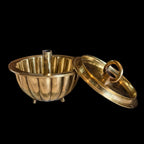 BRONZE CAKE VESSEL