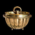 BRONZE CAKE VESSEL