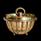 BRONZE CAKE VESSEL