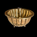 BRONZE CAKE VESSEL